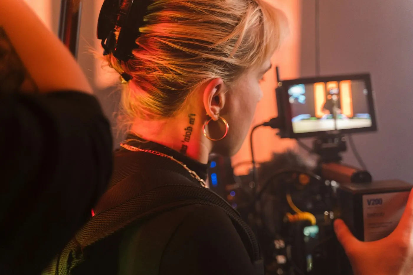 A creator filming a video with a camera